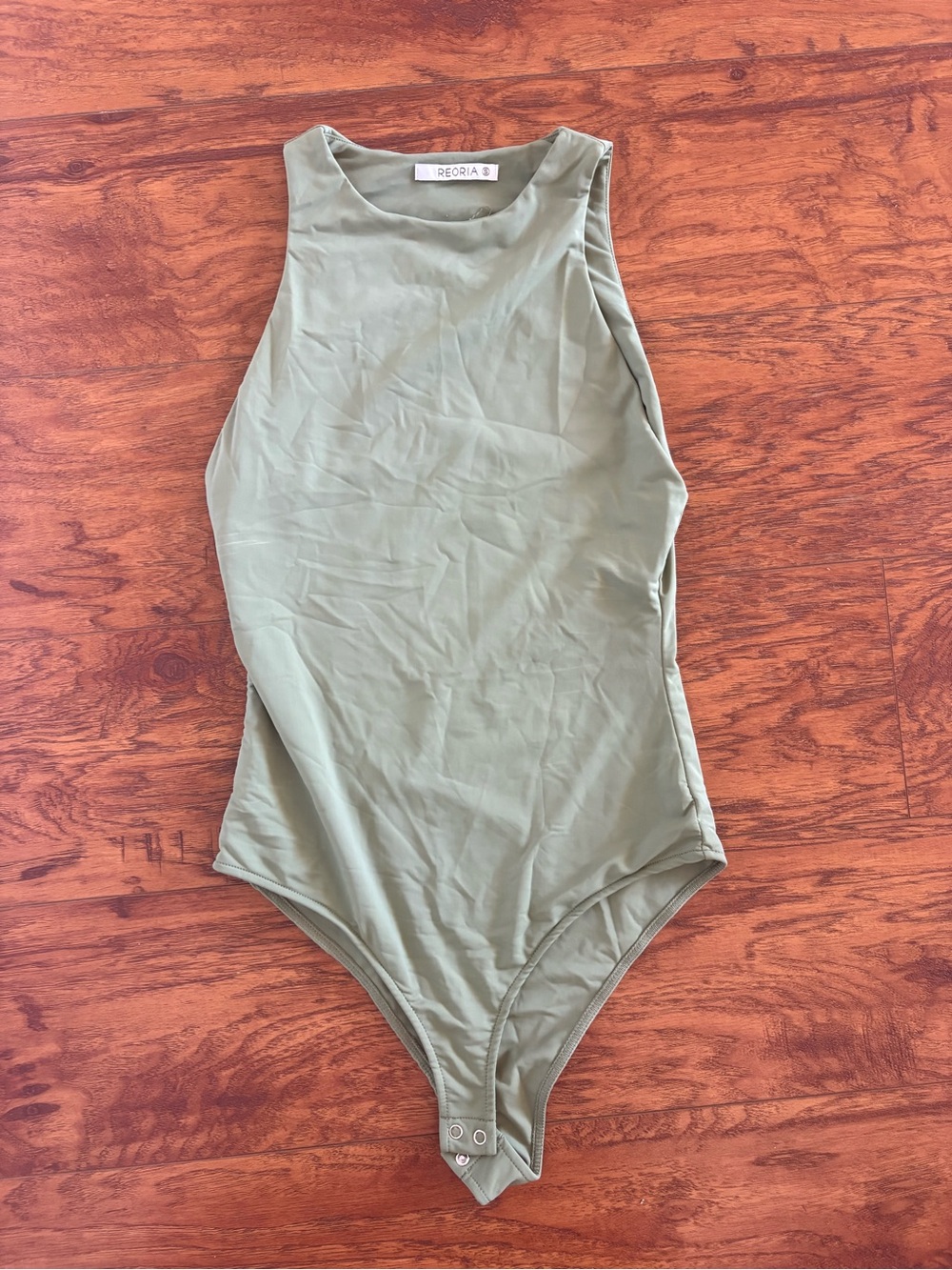 Reoria Women’s Green One-Piece Bodysuit
